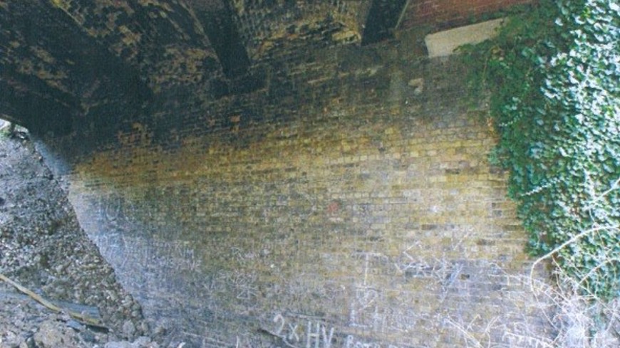 East abutment showing vegetation growth beneath bridge 2005